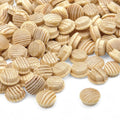 pile of 10 mm pine mushroom button plugs