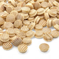 pile of 12 mm pine mushroom button plugs