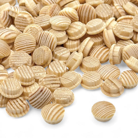 pile of 12 mm pine mushroom button plugs