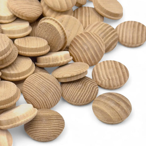 pile of 20 mm ash mushroom button plugs