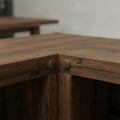 Turned wooden mushroom plug used to conceal screws in furniture