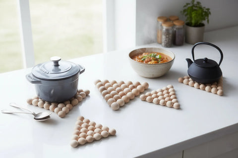 Kitchen trivets made from turned wooden beads