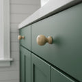 37 mm slim round oak wooden cabinet knob installed on cabinet door