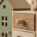 25 mm turned wooden peg knob installed on cabinet door