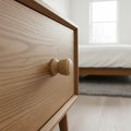30 mm decorative turned oak wooden cabinet knob installed on cabinet door