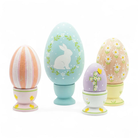 decorated turned wooden easter eggs with colored egg holder
