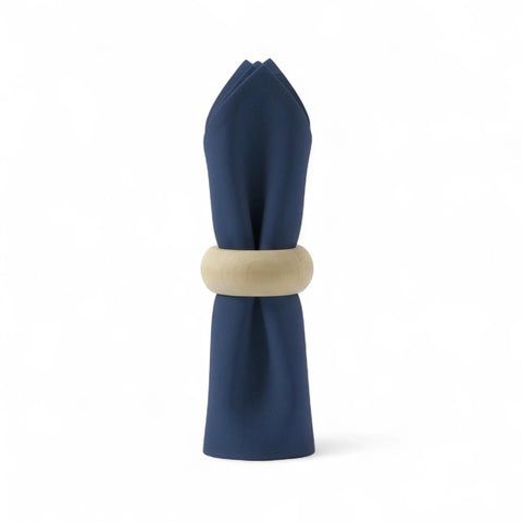 Napkin placed in turned wood napkin ring